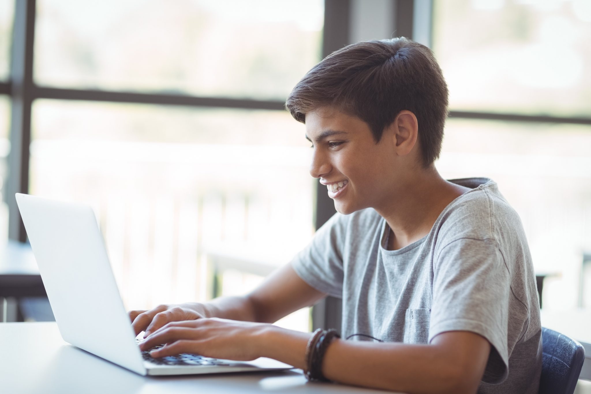 Student looking at laptop