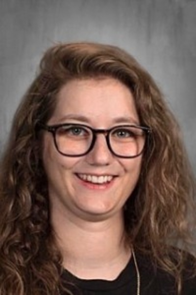 Person smiling in headshot