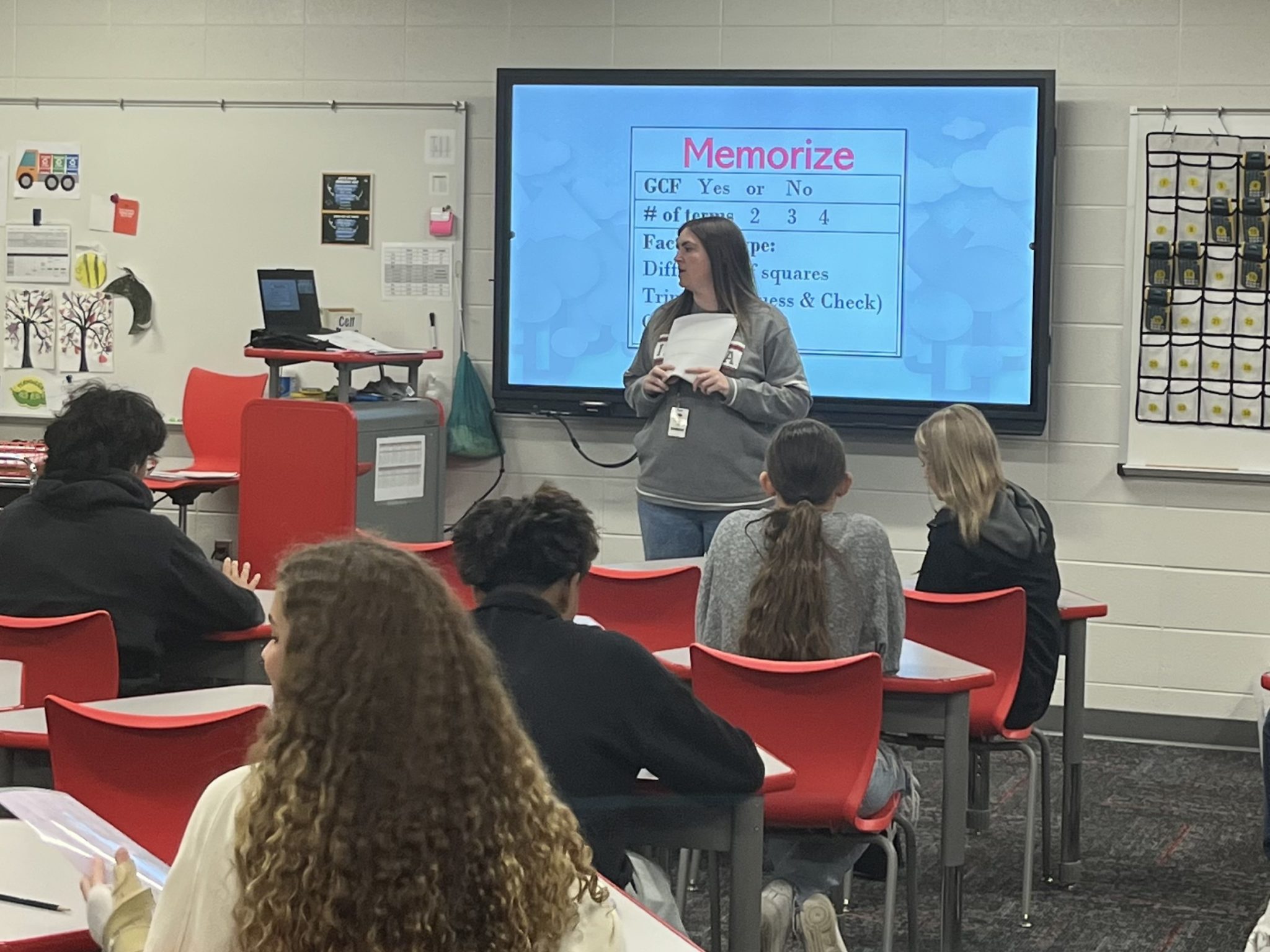 Teacher in front of classroom