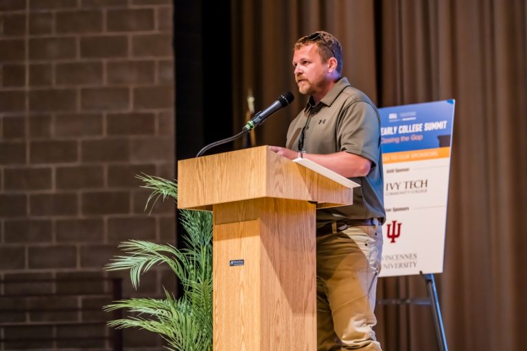 Person behind podium