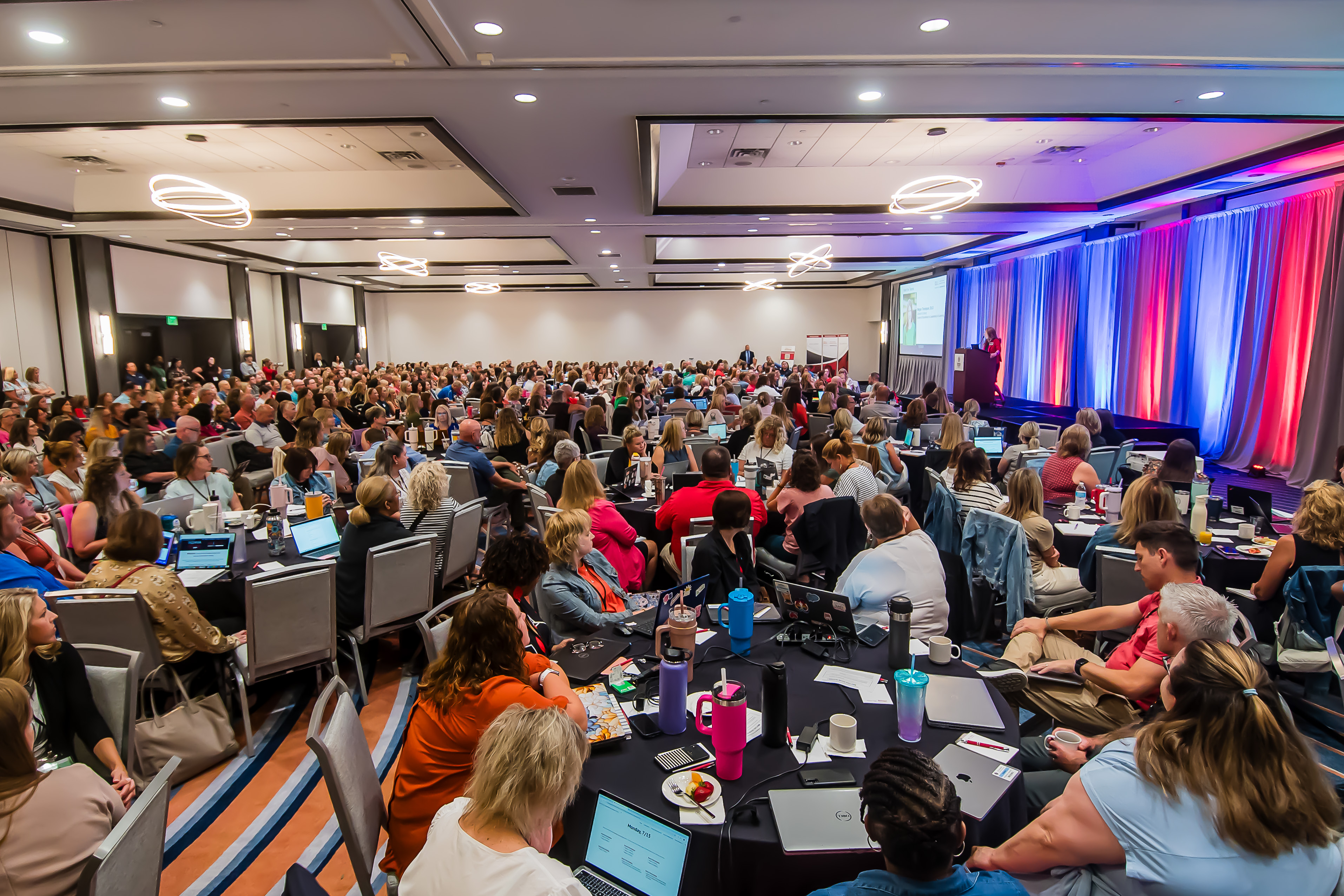 Large group of educators seated in a room