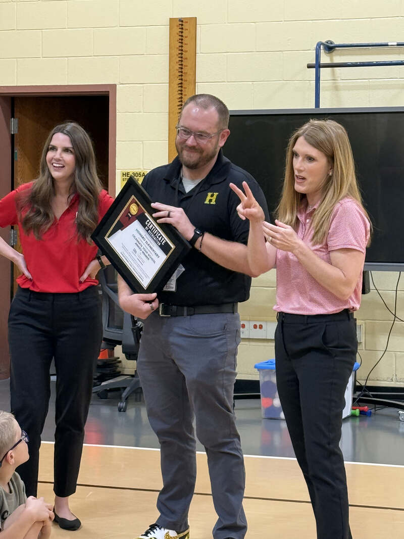 Principal Jordan Nelson receiving the Celebrate Your School Award
