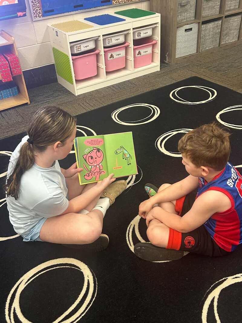 Students reading together