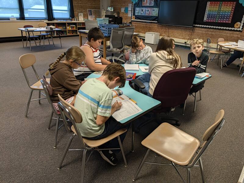 Students engaged in a literacy lesson
