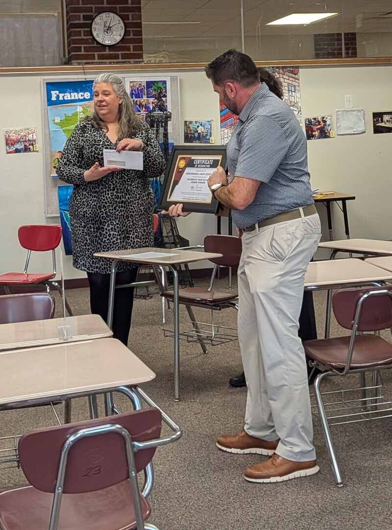 Jessica Mann receiving CELL's Celebrate Your School Award