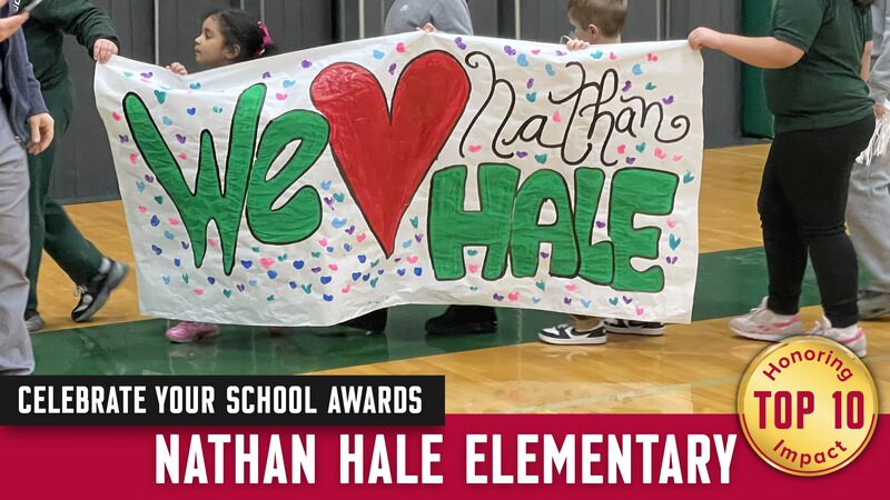 Students holding "We Love Nathan Hale" banner