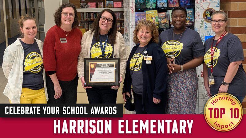 Members of Harrison's team accepting the award